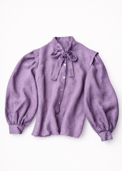 Purple blouse with balloon sleeves and a bow tie on a white background